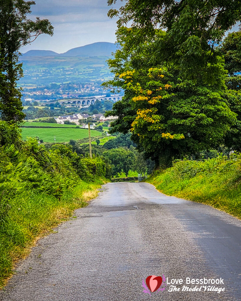 The view this evening down the Divernagh Road Bessbrook, looking out towards the 18 arches and the Mourne mountains.